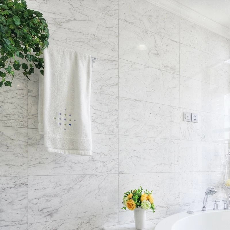 White Carrara C Honed Elegance: 12x24 Marble Tile